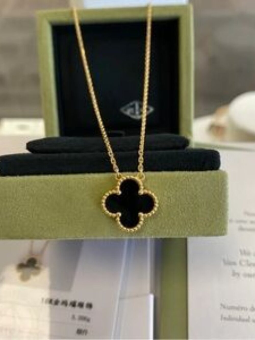 Van Cleef & Arpels Black and Gold Clover Necklace